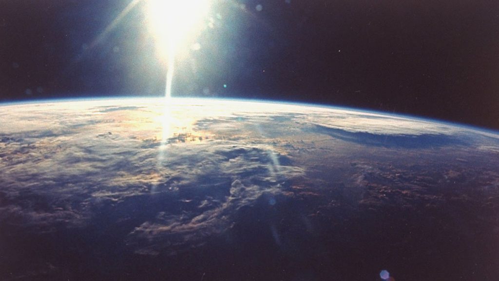 View Of Sunlight Over Earth Taken From S